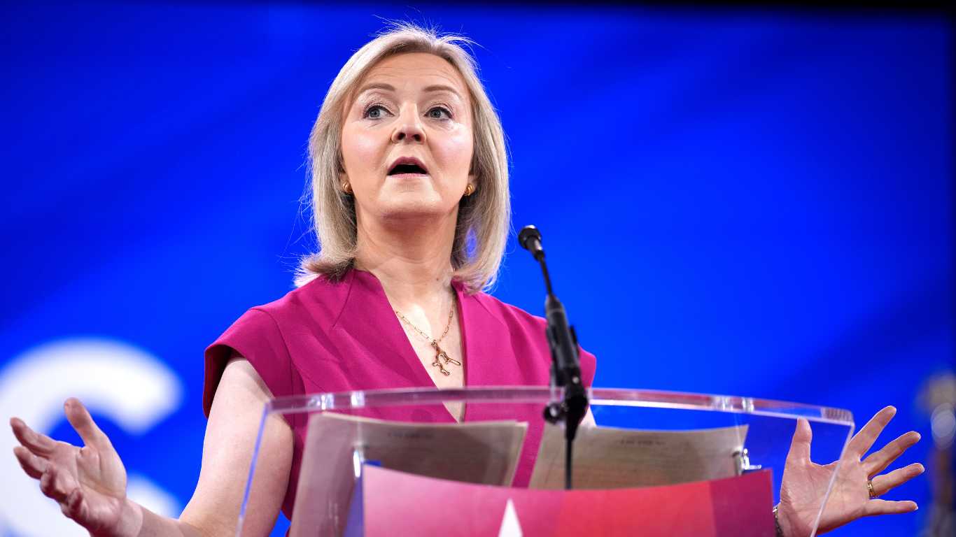 Liz Truss tells right-wing conference UK is 'failing' and needs MAGA-style movement