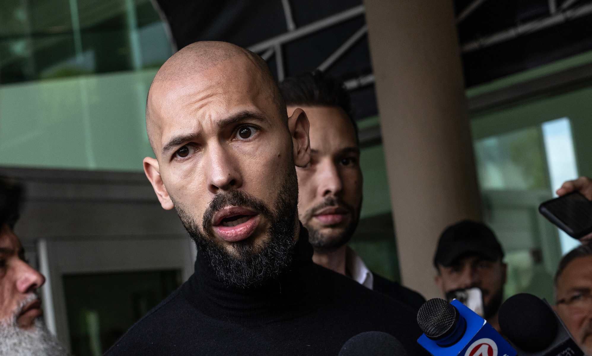 How 'misogynist influencer' Andrew Tate went from Big Brother star to human trafficking suspect