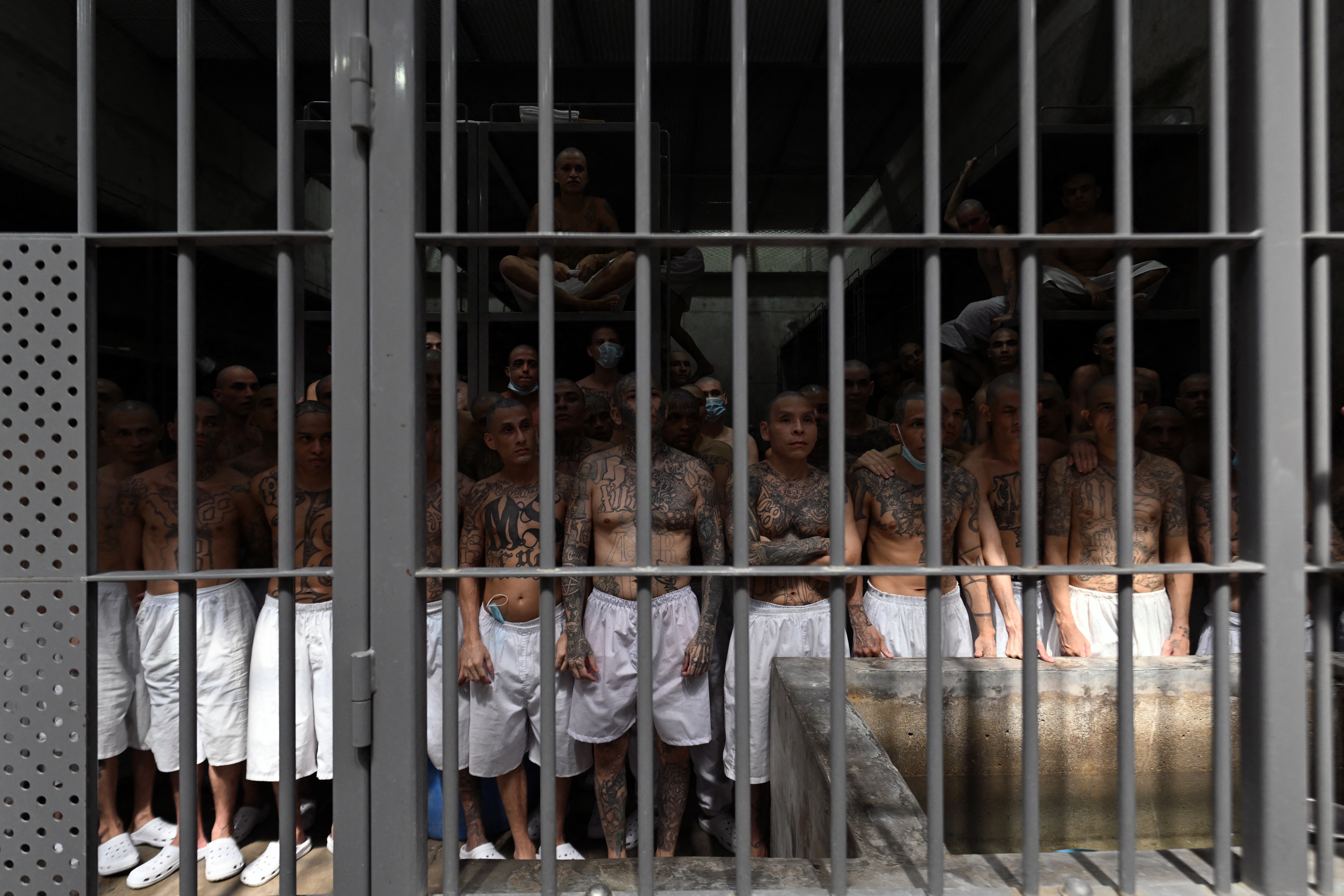 Inmates remain in a cell at the Counter-Terrorism Confinement Centre (CECOT) mega-prison.