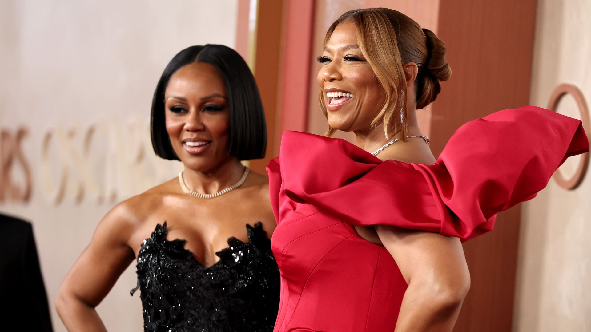 Queen Latifah and partner Eboni Nichols wow fans on the Oscars' red carpet