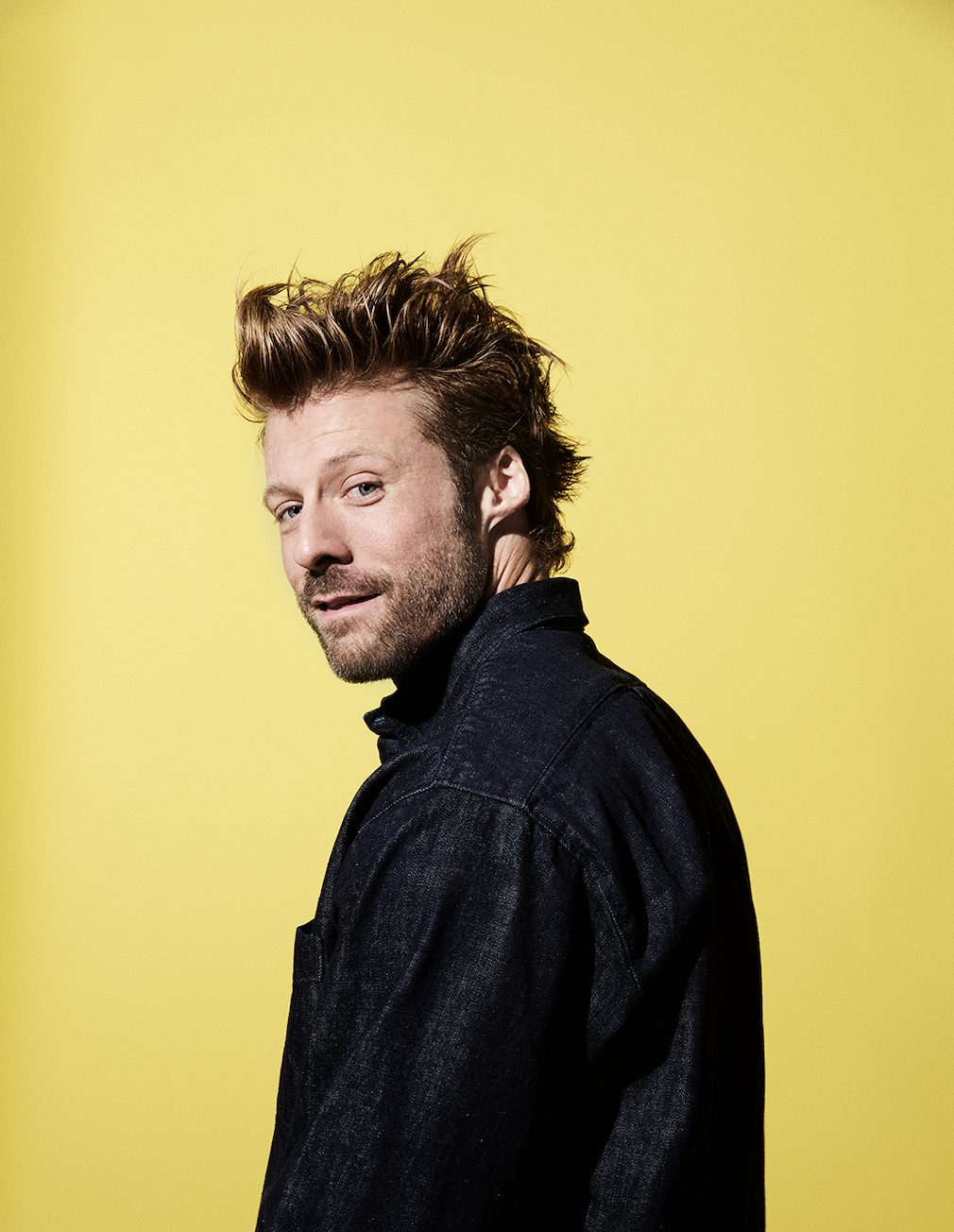 Taylor Napier against a yellow background