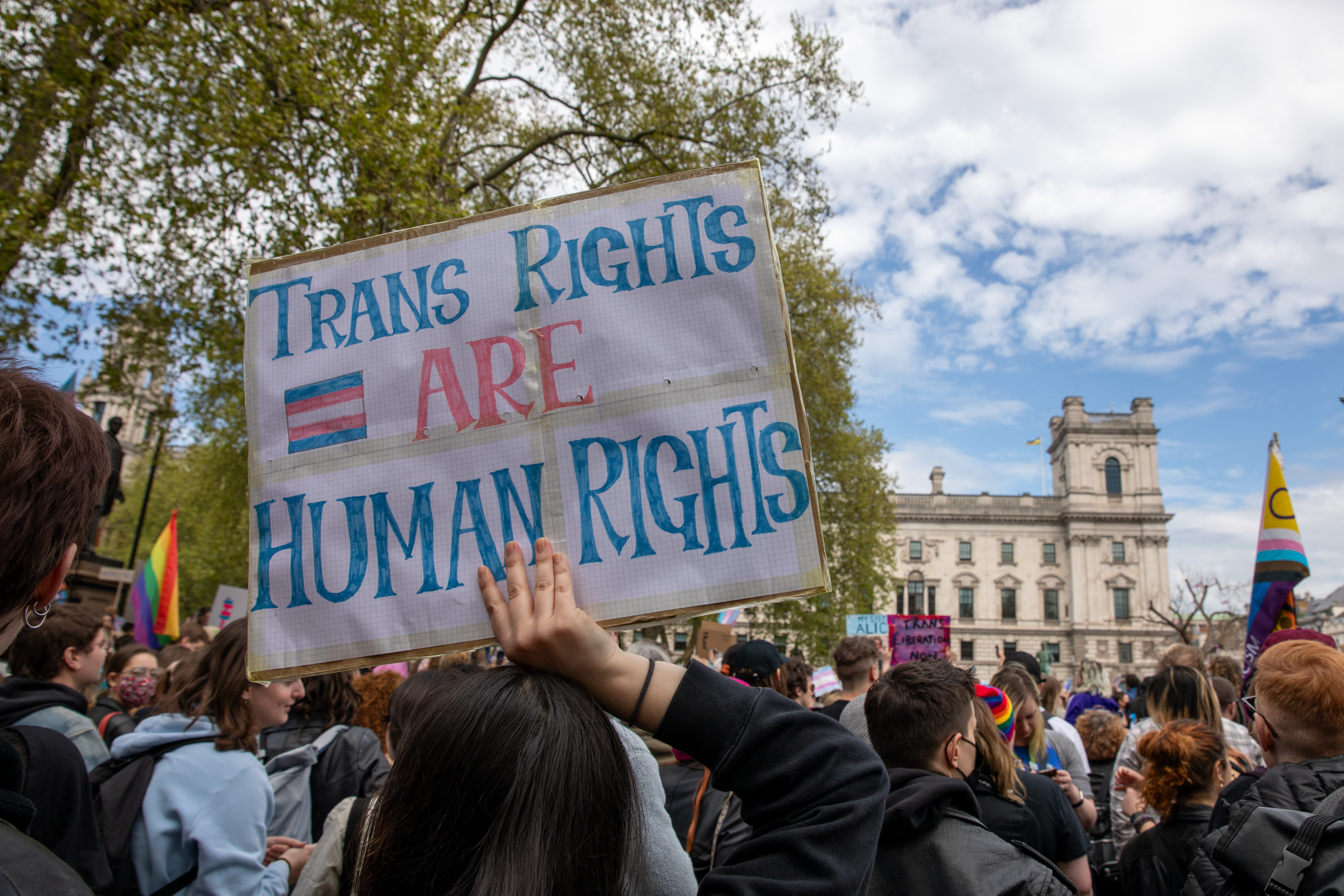 LONDON, WESTMINSTER, UNITED KINGDOM - 2025/04/19: A Trans rights activist holds a placard during the demonstration. Members of the Trans community and their supporters held an emergency demonstration in Central London calling for &quot;Trans Liberation&quot;. After a UK Supreme Court ruling that the definition of a woman should be based on biological sex, a demonstration was organised to show support for Trans Men and Women. At 12:00 on Saturday 19th April 2025, crowds gathered in Parliament Square Westminster for a rally and march. At approximately 13:30 the demonstrators left Parliament Square and headed through Westminster stopping at several contentious locations including the Supreme Court. (Photo by James Willoughby/SOPA Images/LightRocket via Getty Images)