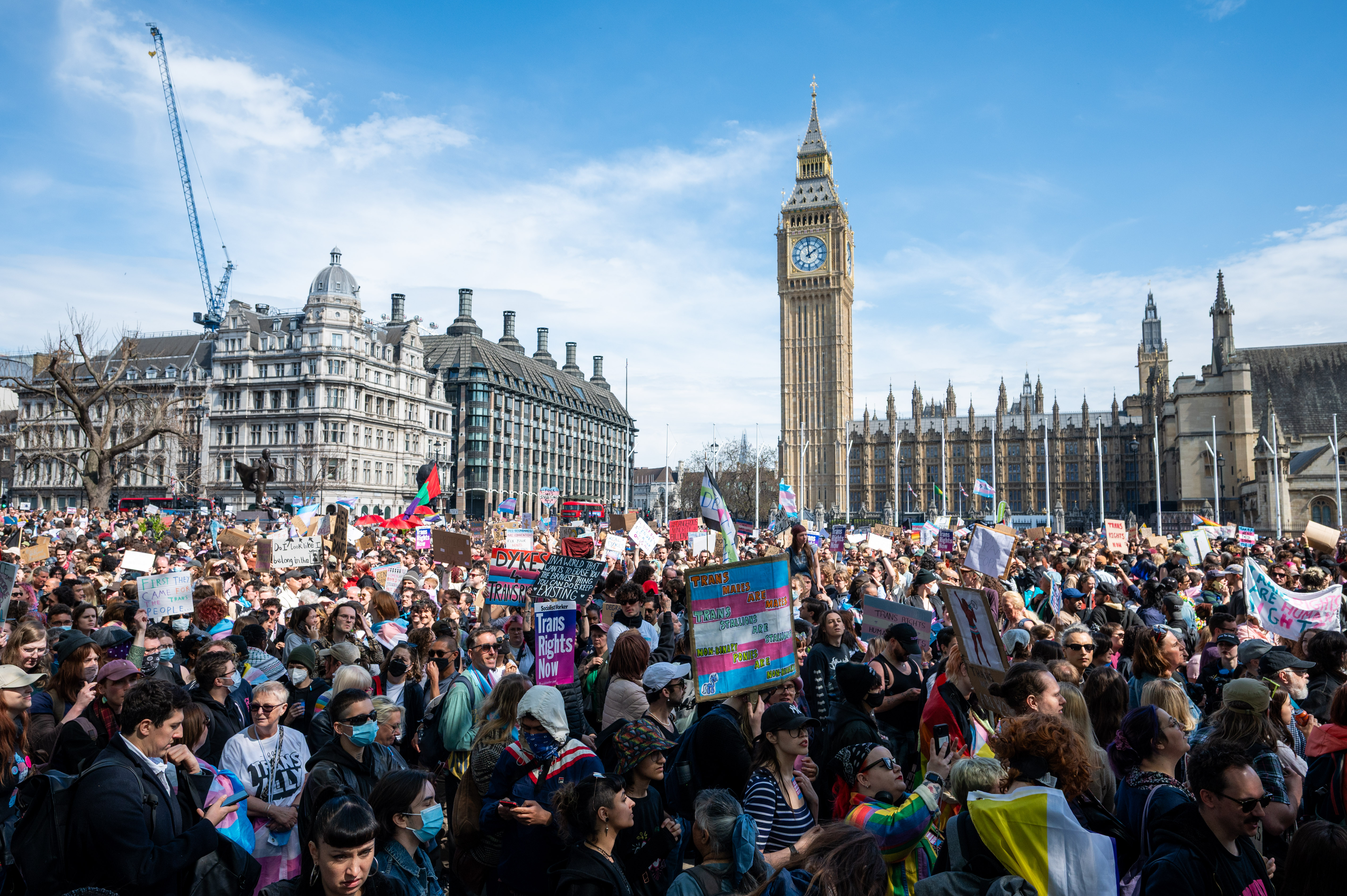 Members of the public gather in Parliament Square with banners and placards as part of the Trans Liberation emergency Protest on April 19, 2025 in London, England. The Trans Liberation Emergency Protest was called following this week