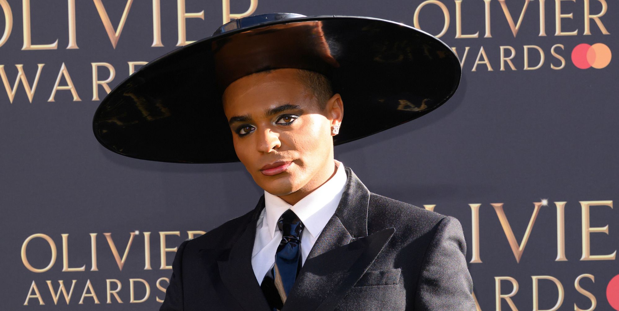 Layton Williams wins first Olivier Award for playing an iceberg – and slays the red carpet in shady outfit