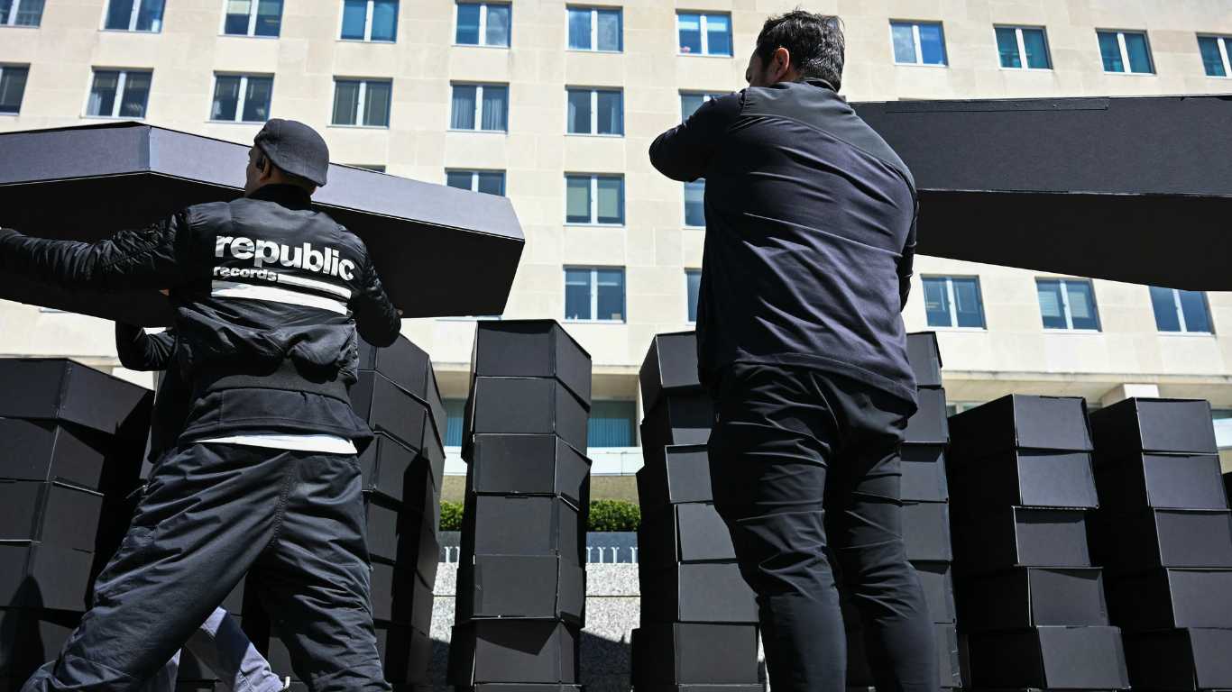 Activists stack 200 coffins outside US state department to protest deadly AIDS relief cuts