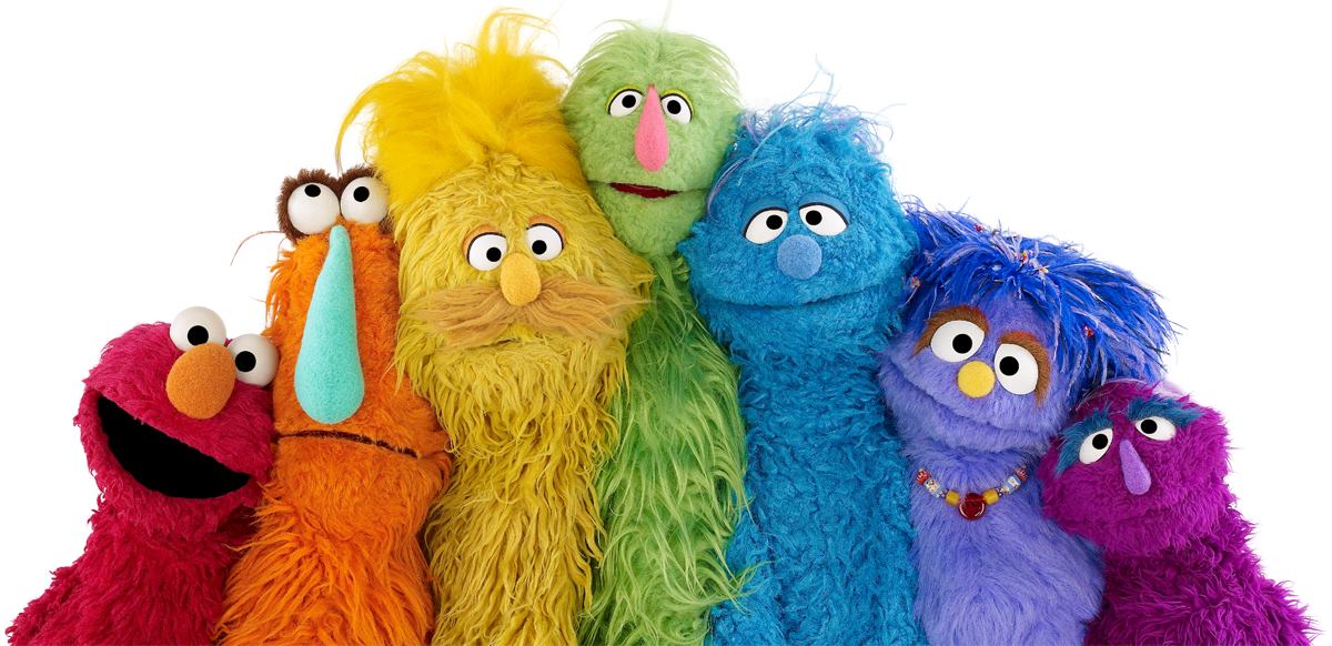 Sesame Street characters lined up in rainbow order.