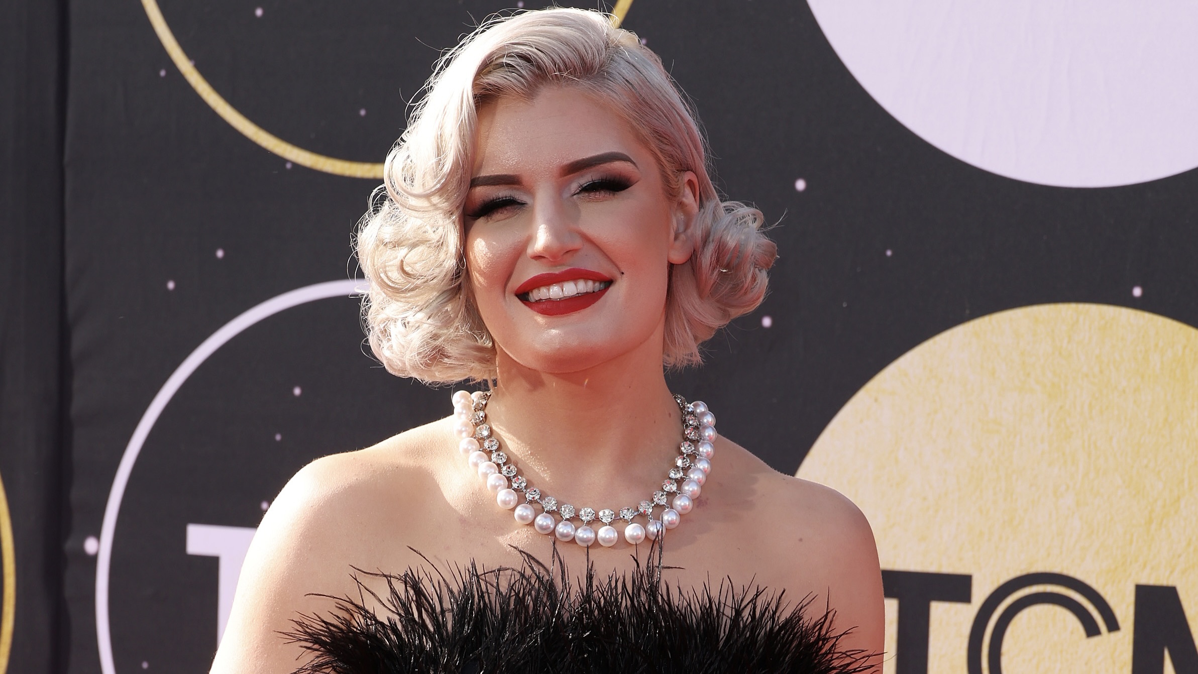 World champion wrestler Toni Storm declares 'I'm here and I'm queer'