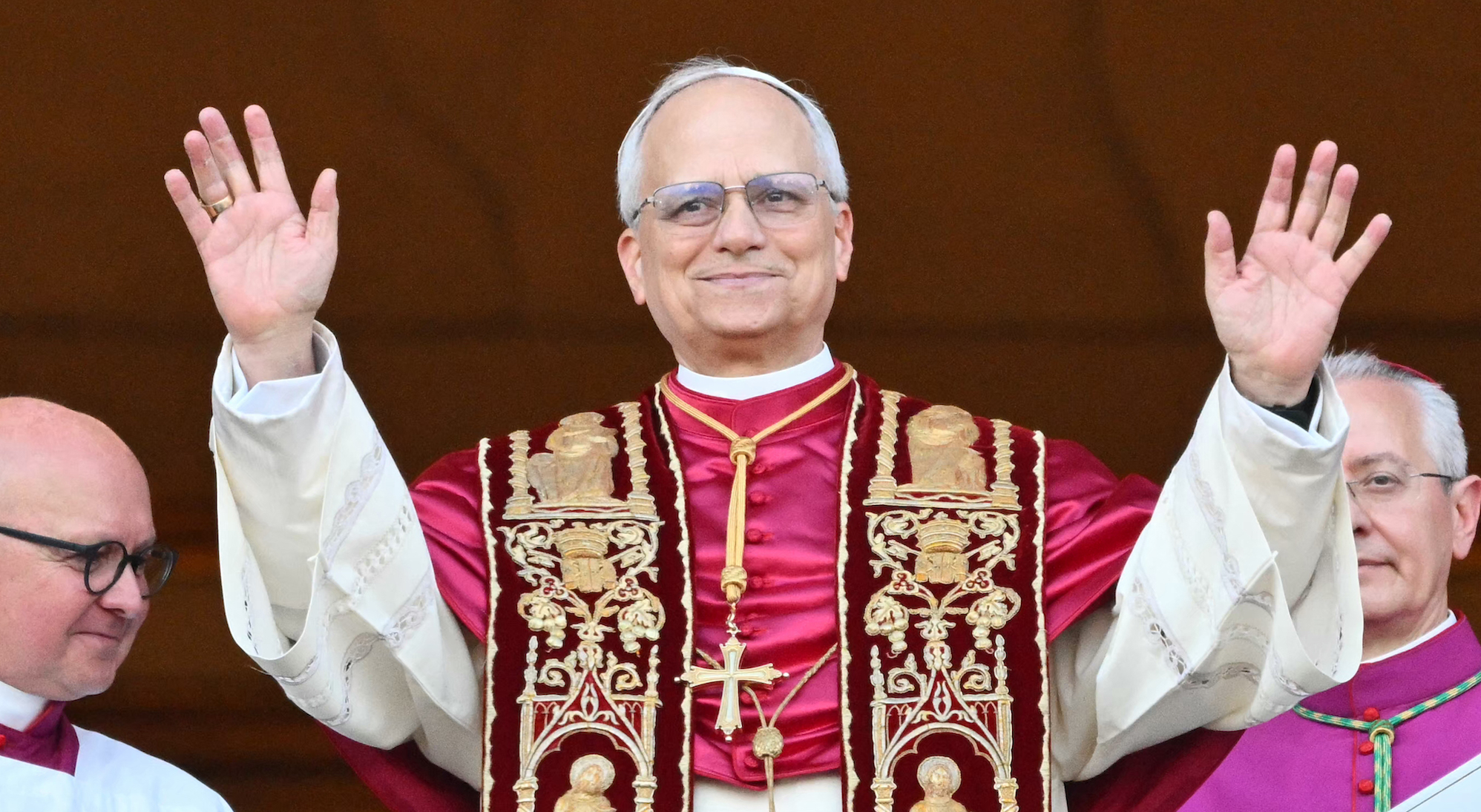 Newly elected Pope Leo XIV, Robert Prevost arrives on the main central loggia balcony of the St Peter