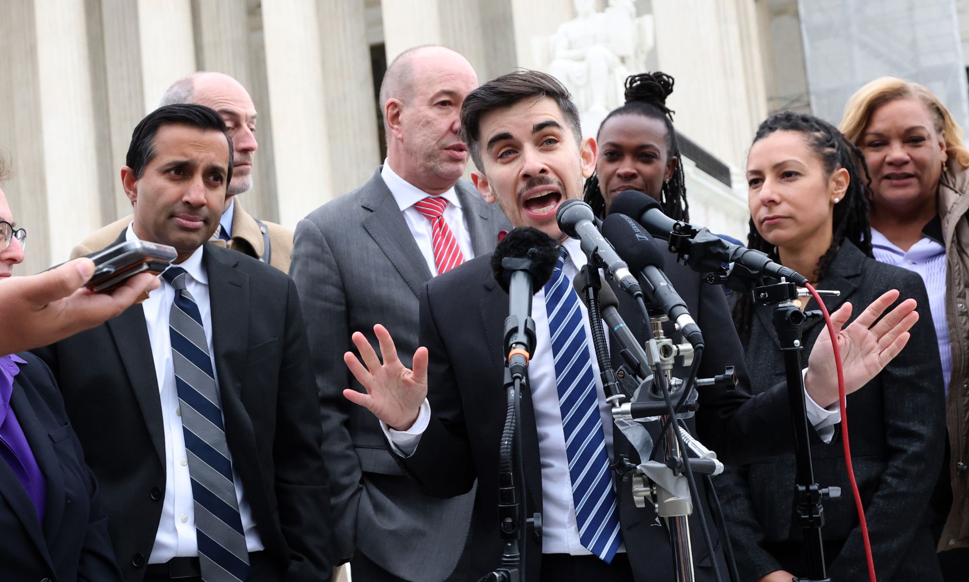 ACLU attorneys outside the Supreme Court after oral arguments in December.
