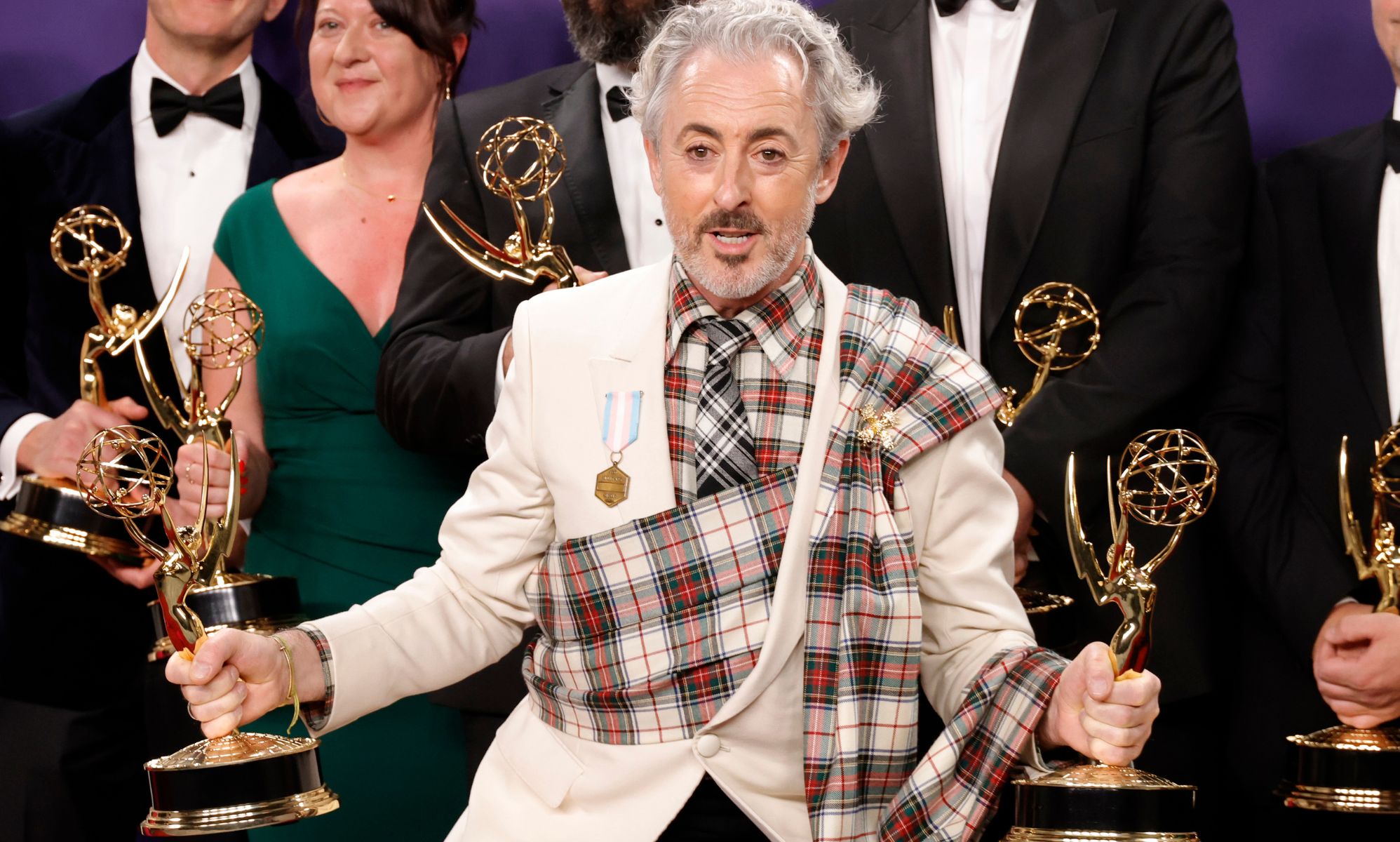 Alan Cummings at the 2024 Emmys Awards giving a speech.