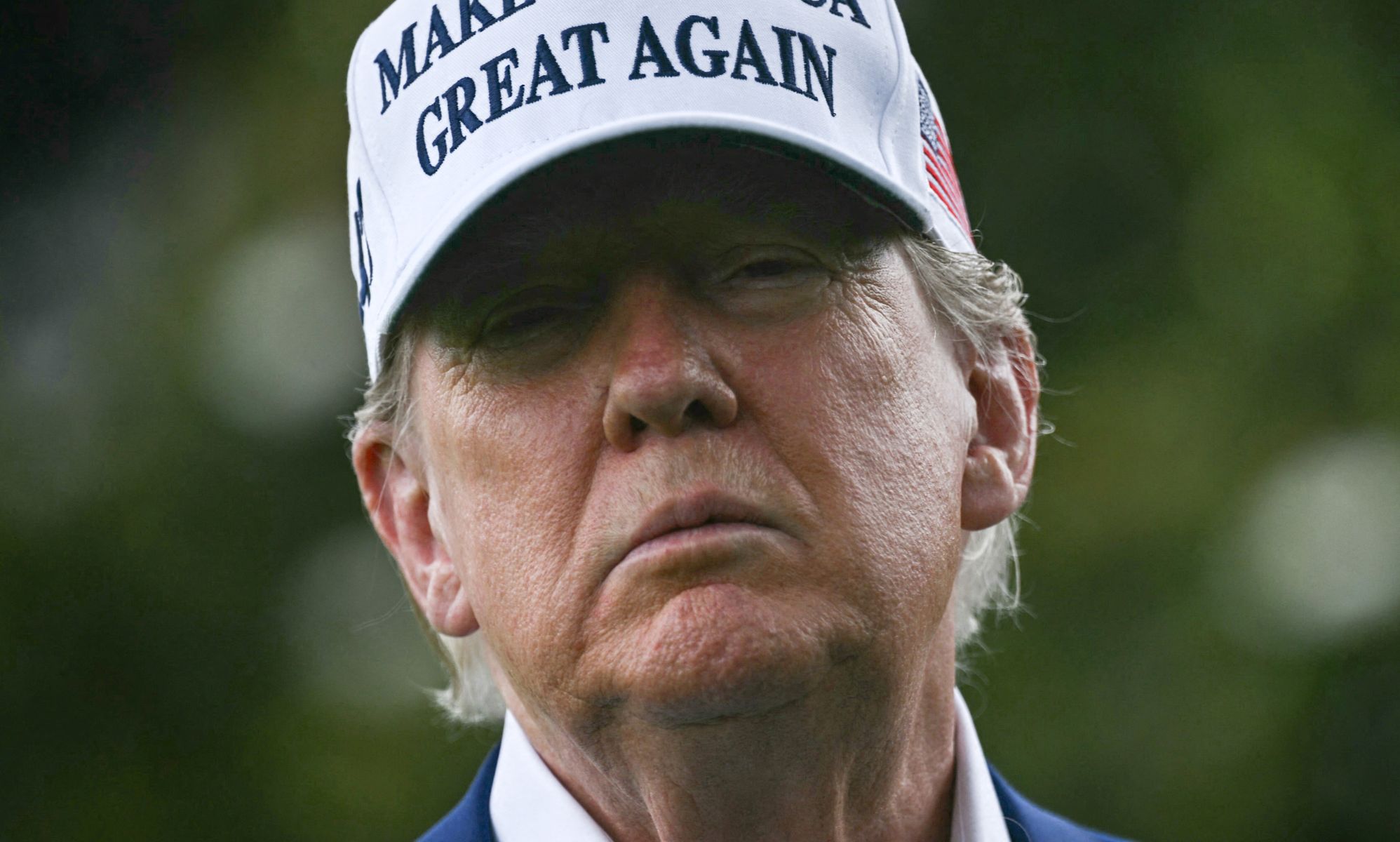 A portrait picture of Donald Trump.