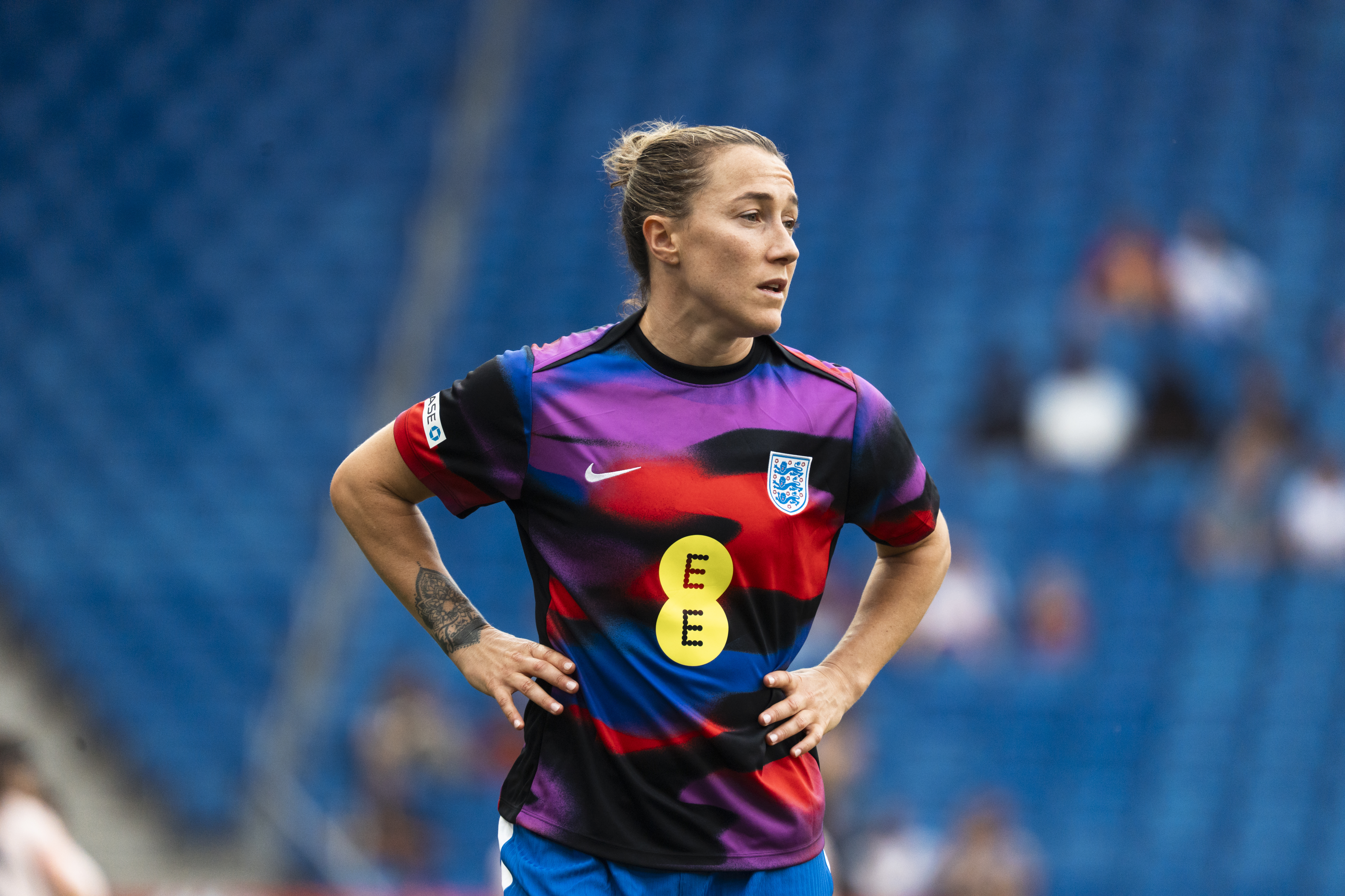 Lucy Bronze on the pitch in the England football kit