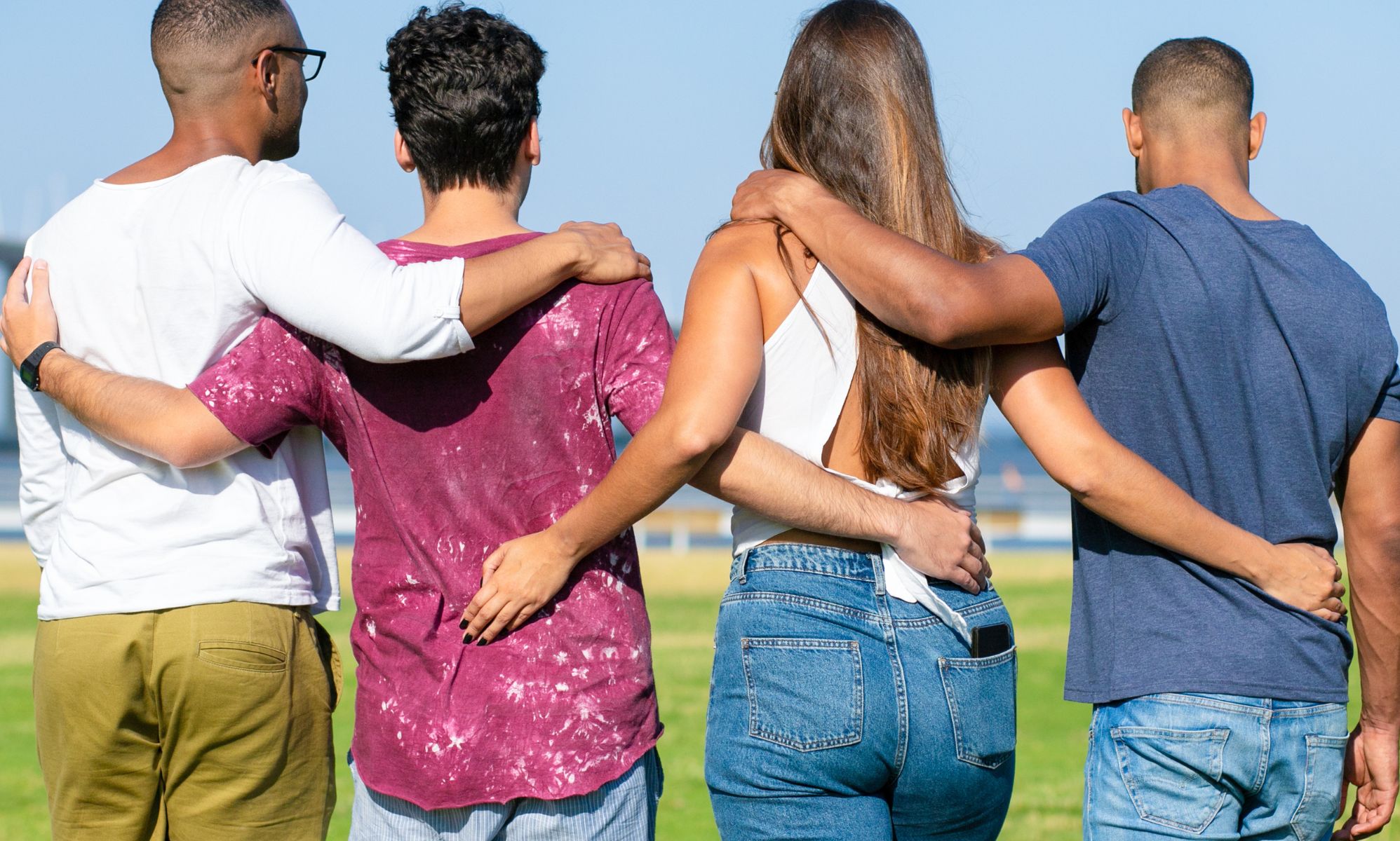 A polycule pictured going for a walk.