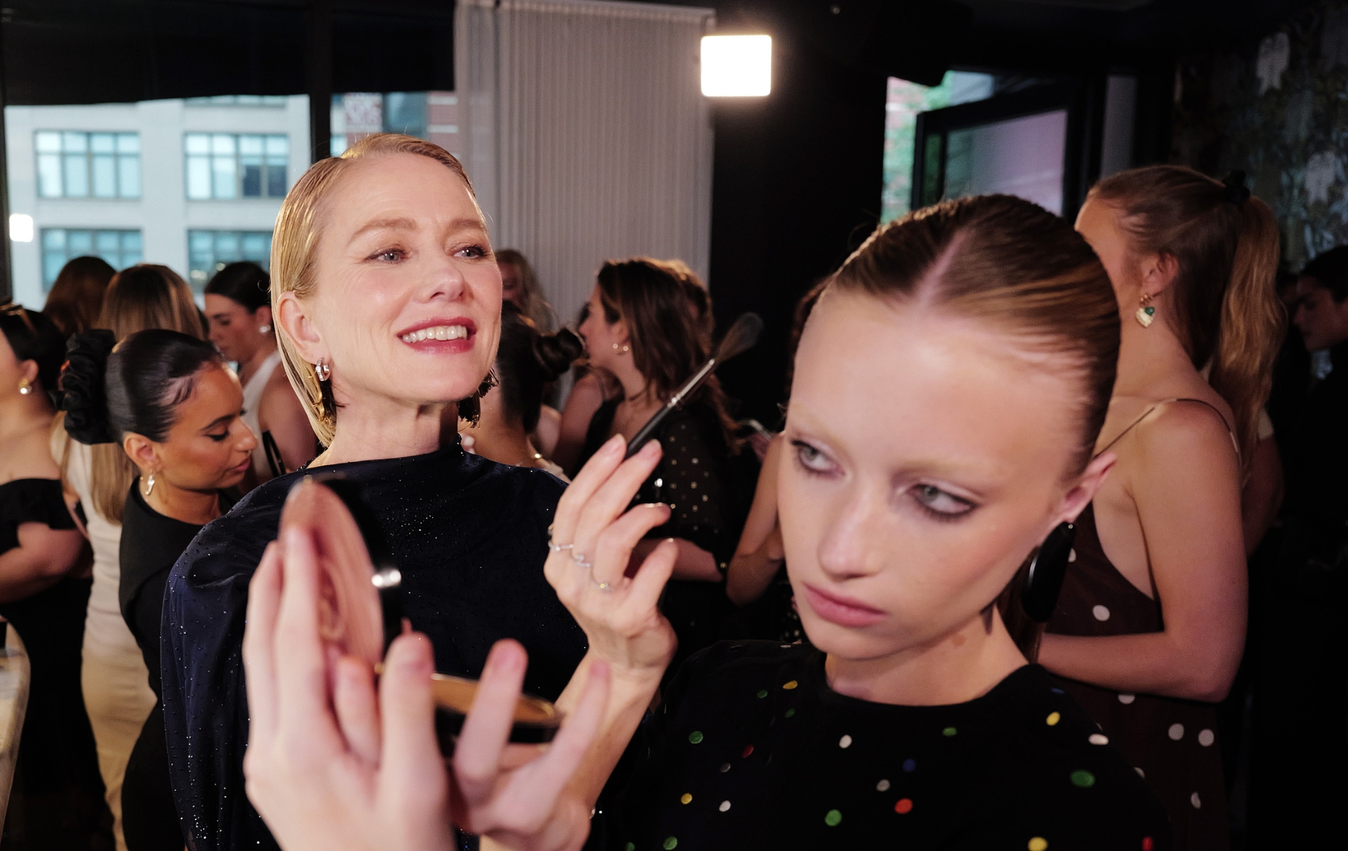 Naomi Watts helps trans daughter Kai Schreiber with her makeup at Armani Beauty event