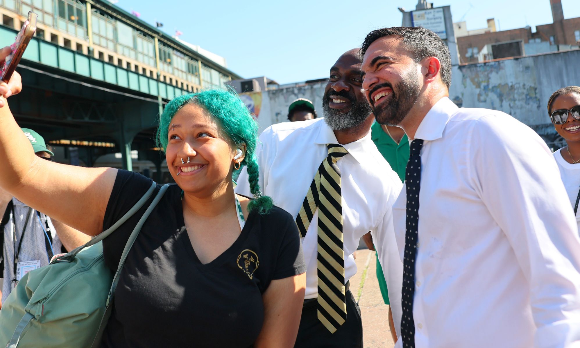 Zahron Mamdani pictured taking a selfie with a supporter. 