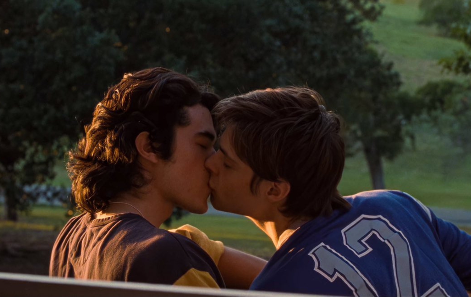 Conan Gray and Corey Fogelmanis kissing in &quot;This Song&quot; music video.
