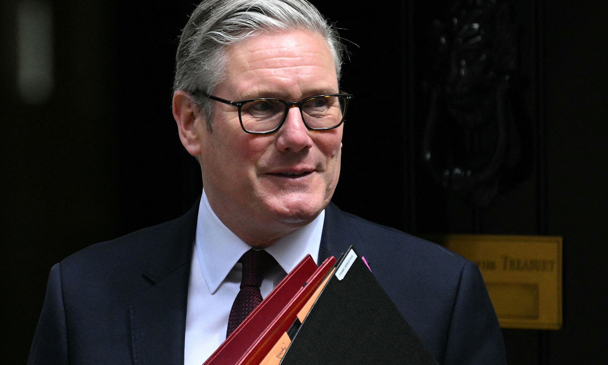 Keir Starmer exiting Number 10 Downing Street.