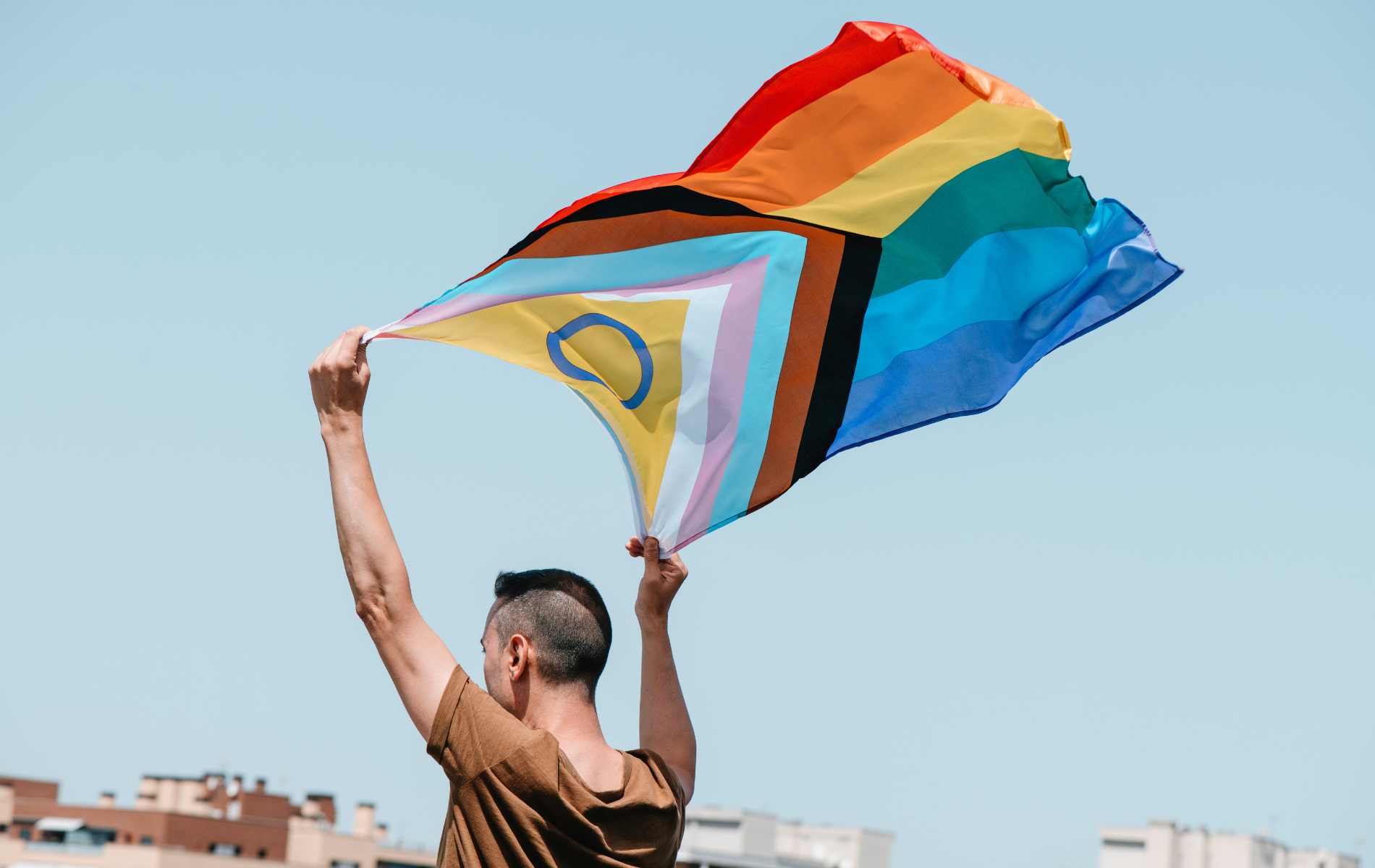 Protesters rally outside Trump Tower to fight for 'life-saving' LGBTQ+ crisis line