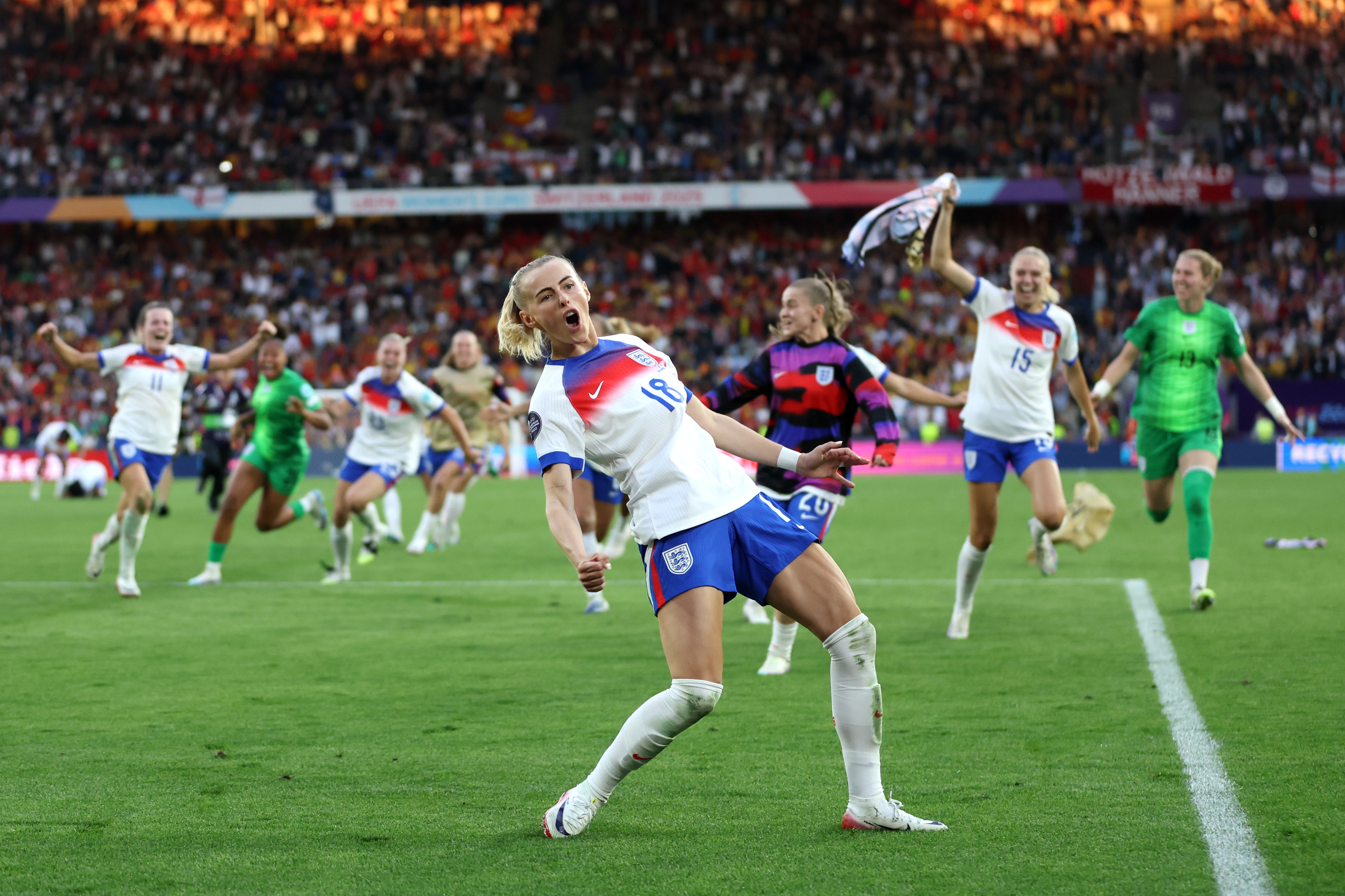 Chloe Kelly of England celebrates after scoring the team
