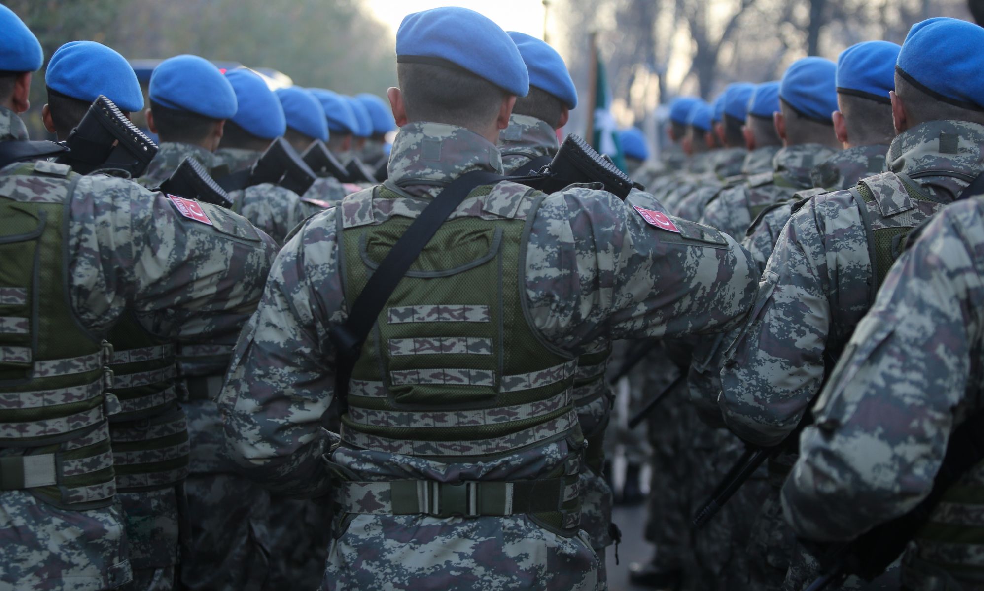 Soldiers from the Turkish military marching in unison. 
