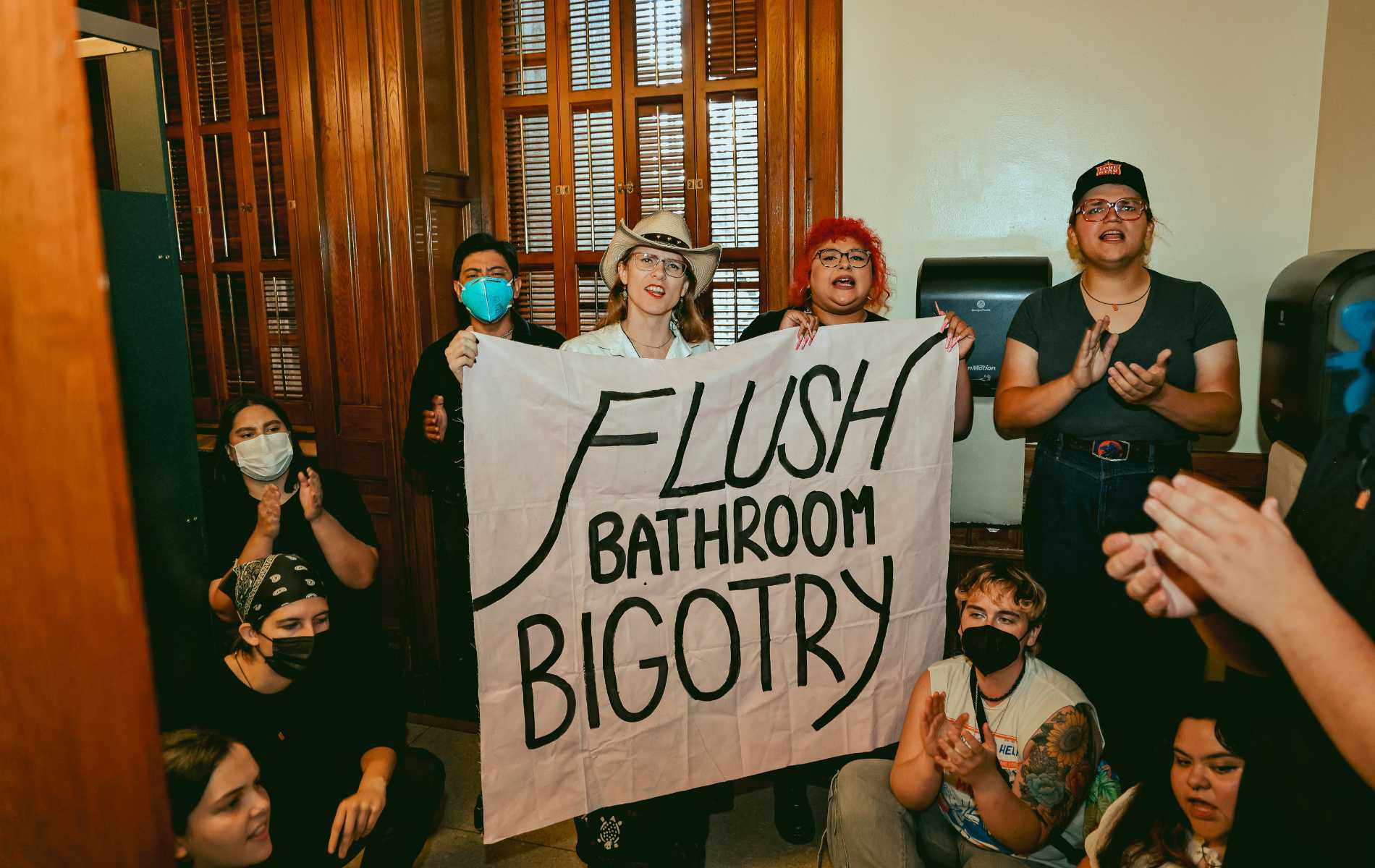 Trans activists occupy toilets in Texas state capitol building to protest 'bigoted' bathroom bill