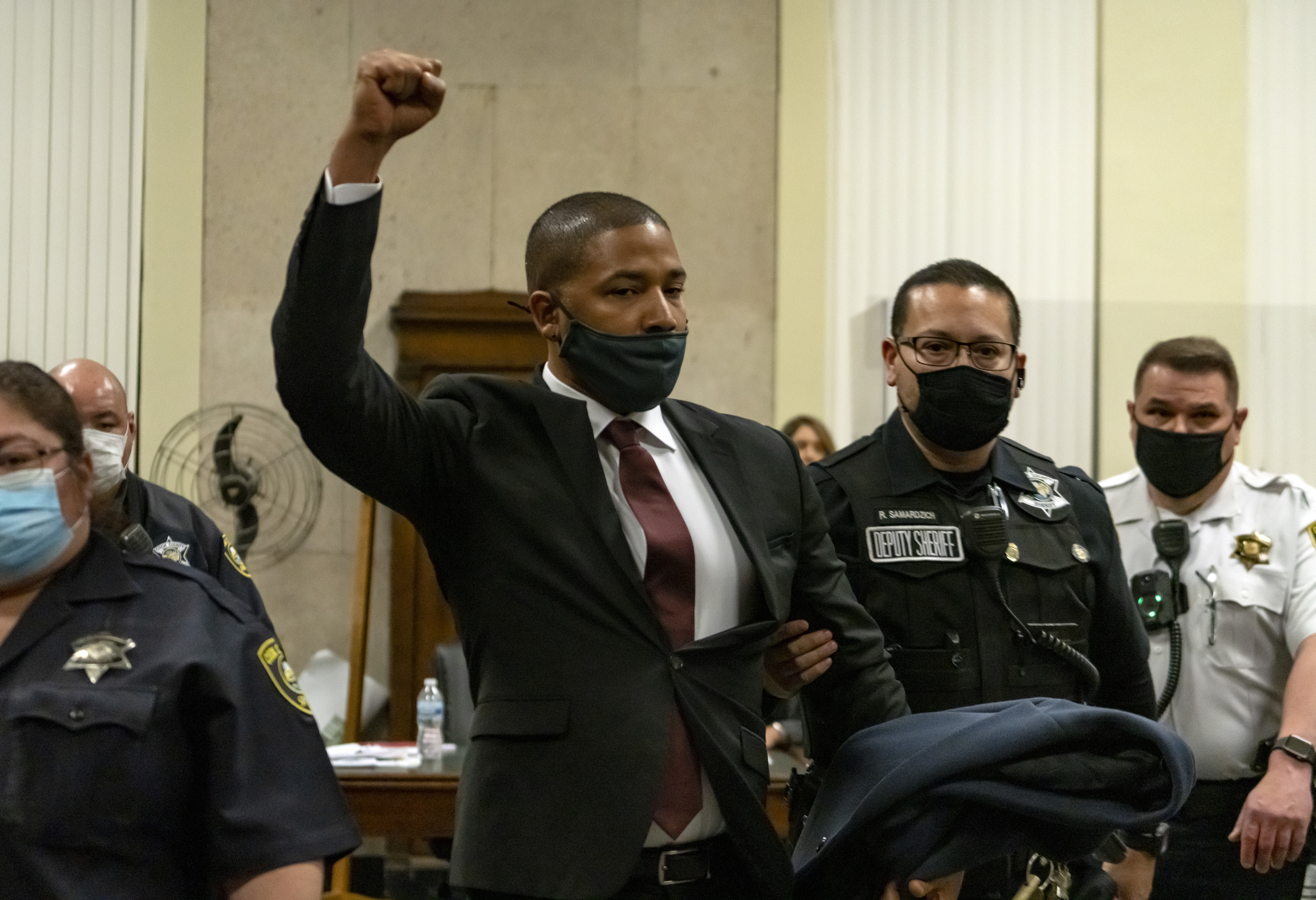 Actor Jussie Smollett is led out of the courtroom after being sentenced at the Leighton Criminal Court Building on March 10, 2022 in Chicago, Illinois. He