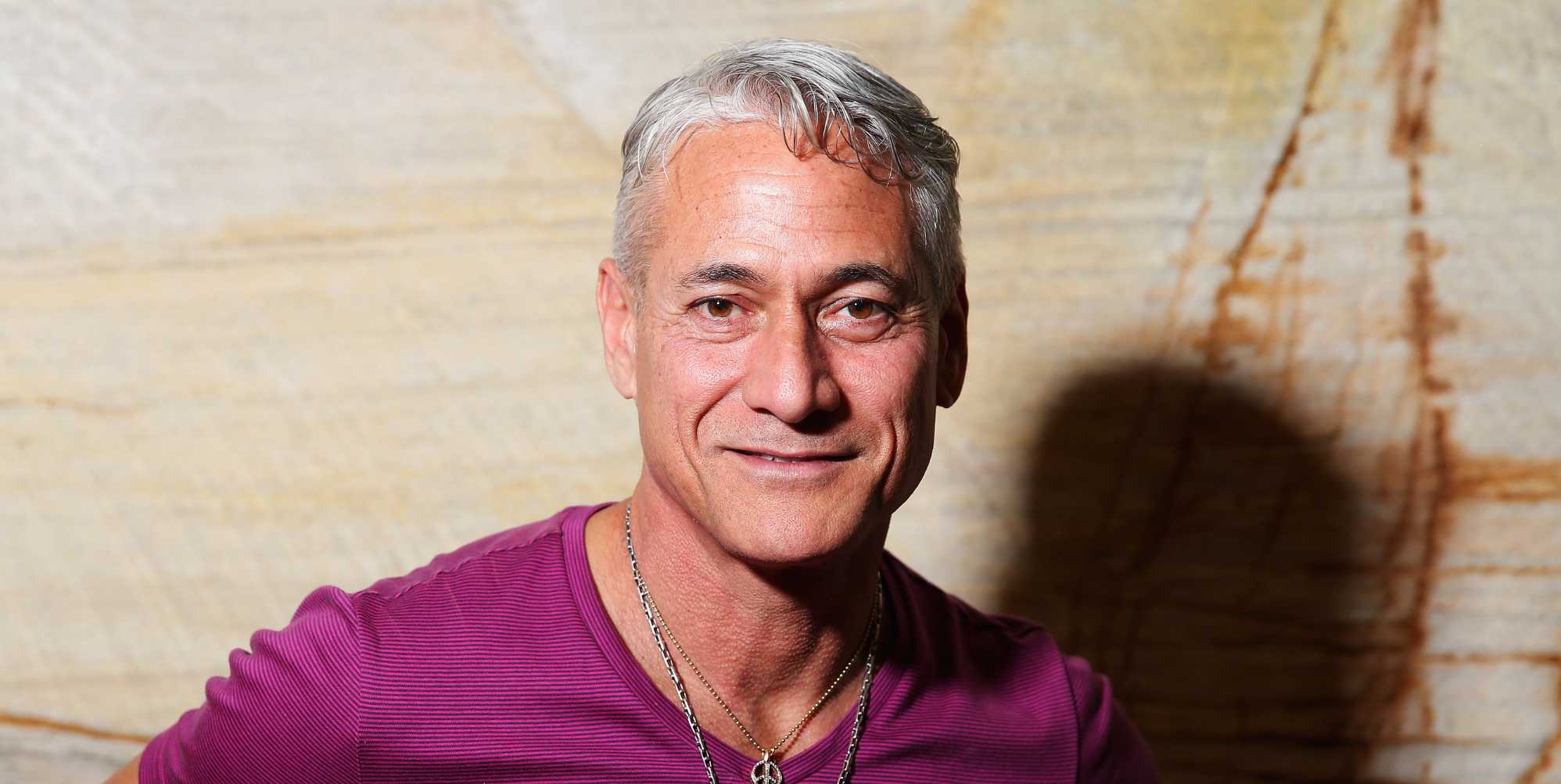 Gay Olympian Greg Louganis sells medals to move out of US