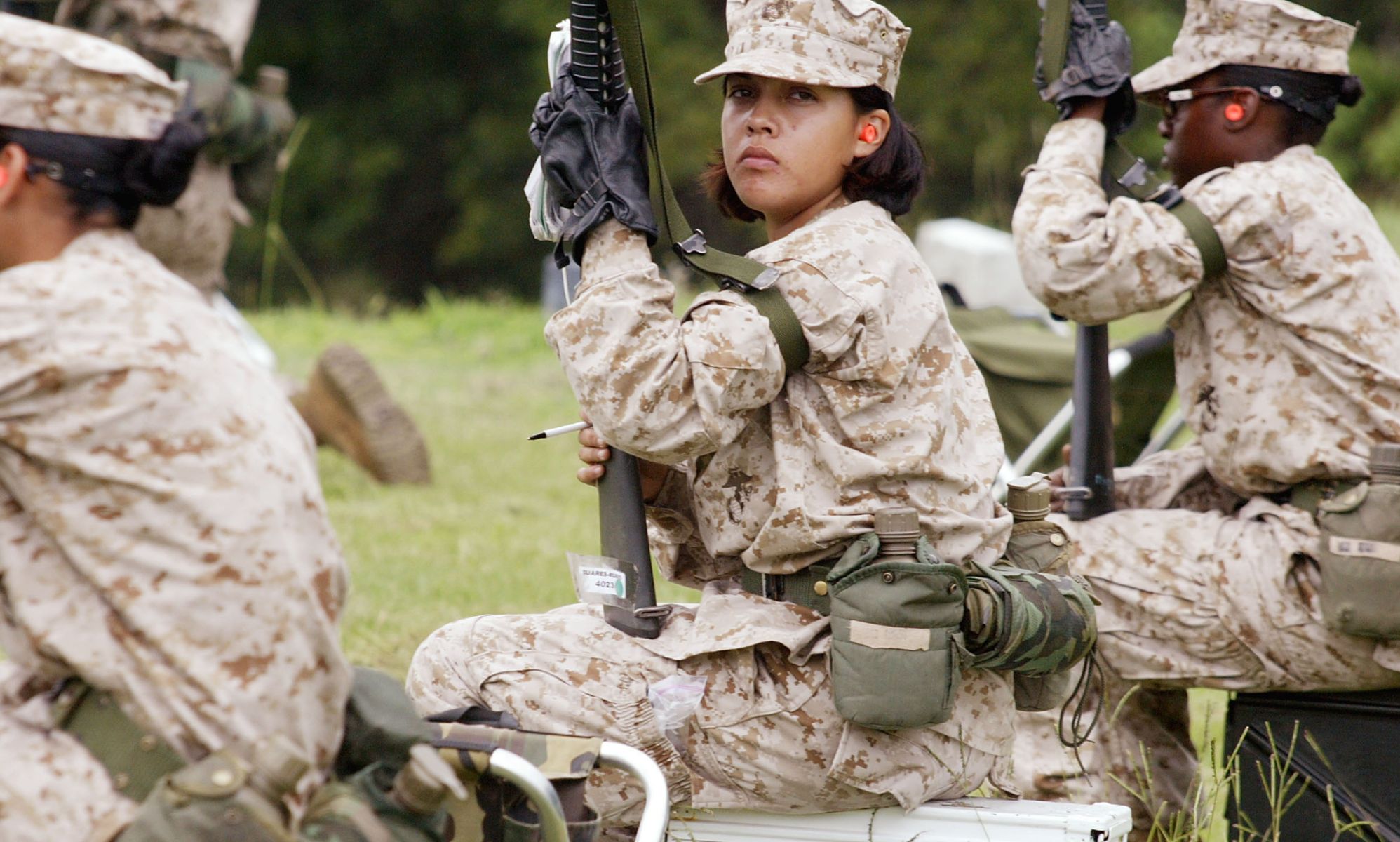 Three women training to become US marines.
