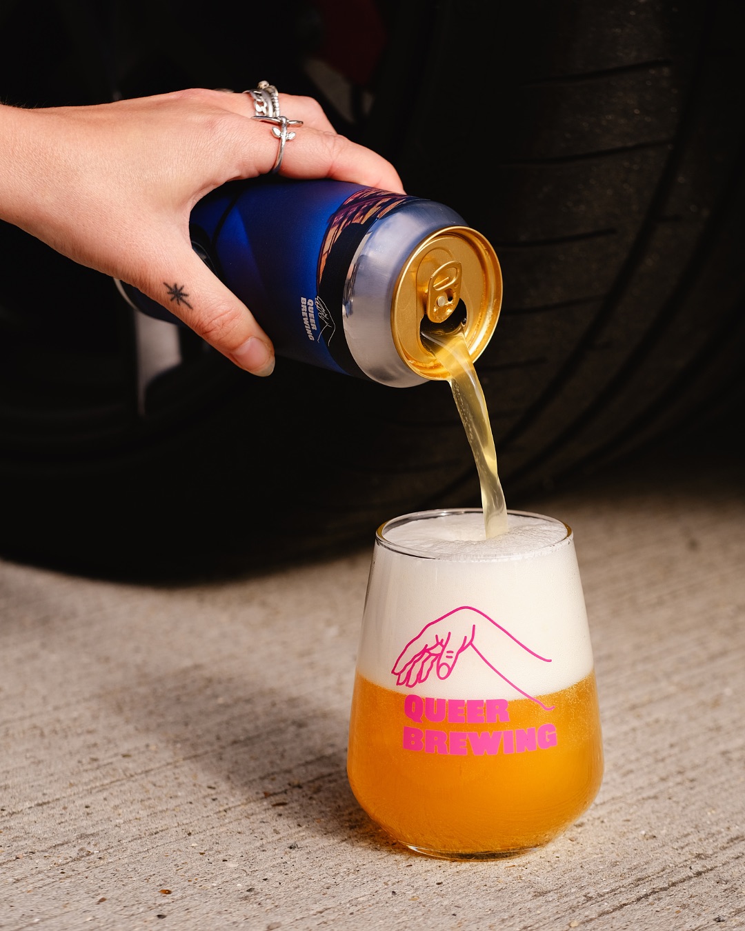 Queer Brewing image: beer can pouring into a glass