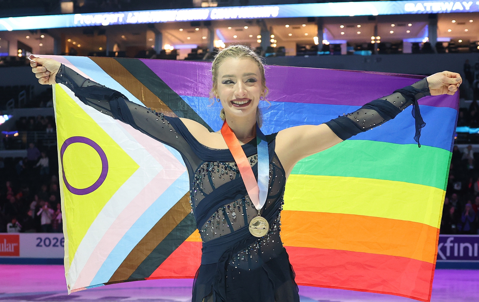 Amber Glenn poses for a photo during the Victory Ceremony after competing in the Women