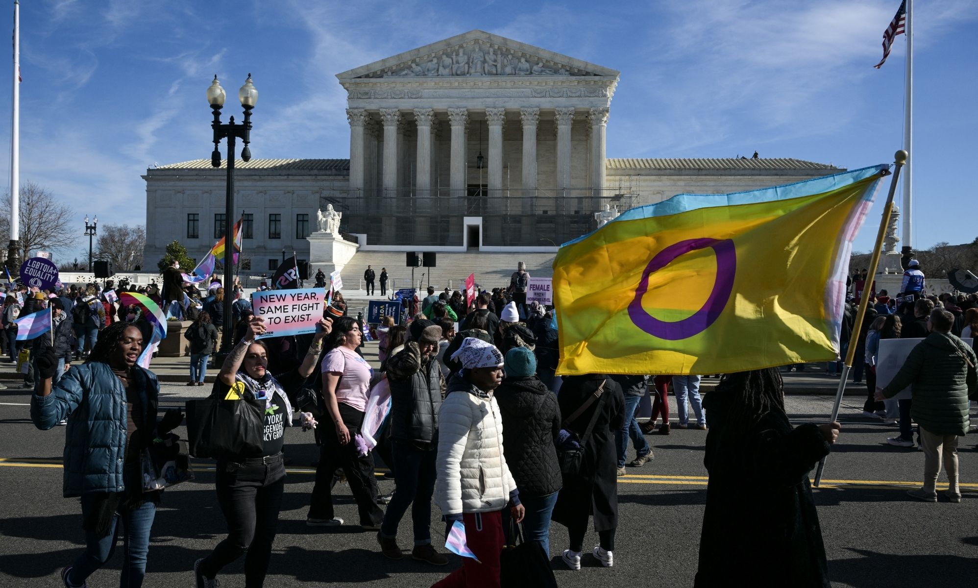 Trans rights activists outside the Supreme Court during its oral hearing on sports bans. 