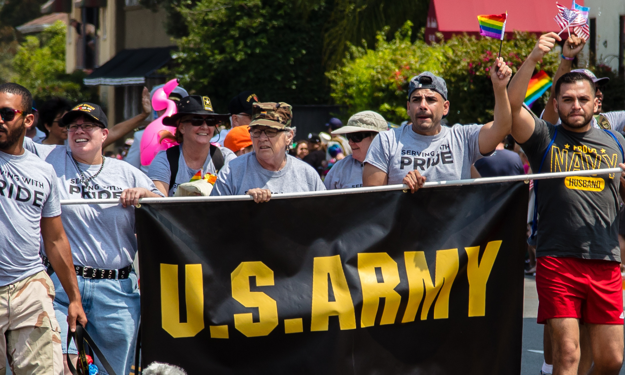 A stretched of US Armed Forces members at a Pride march.