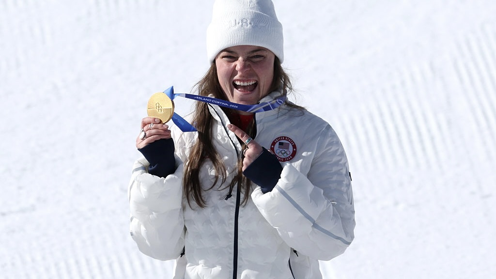 First 'Team LGBTQ+' medallist at 2026 Winter Olympics breaks gold medal immediately