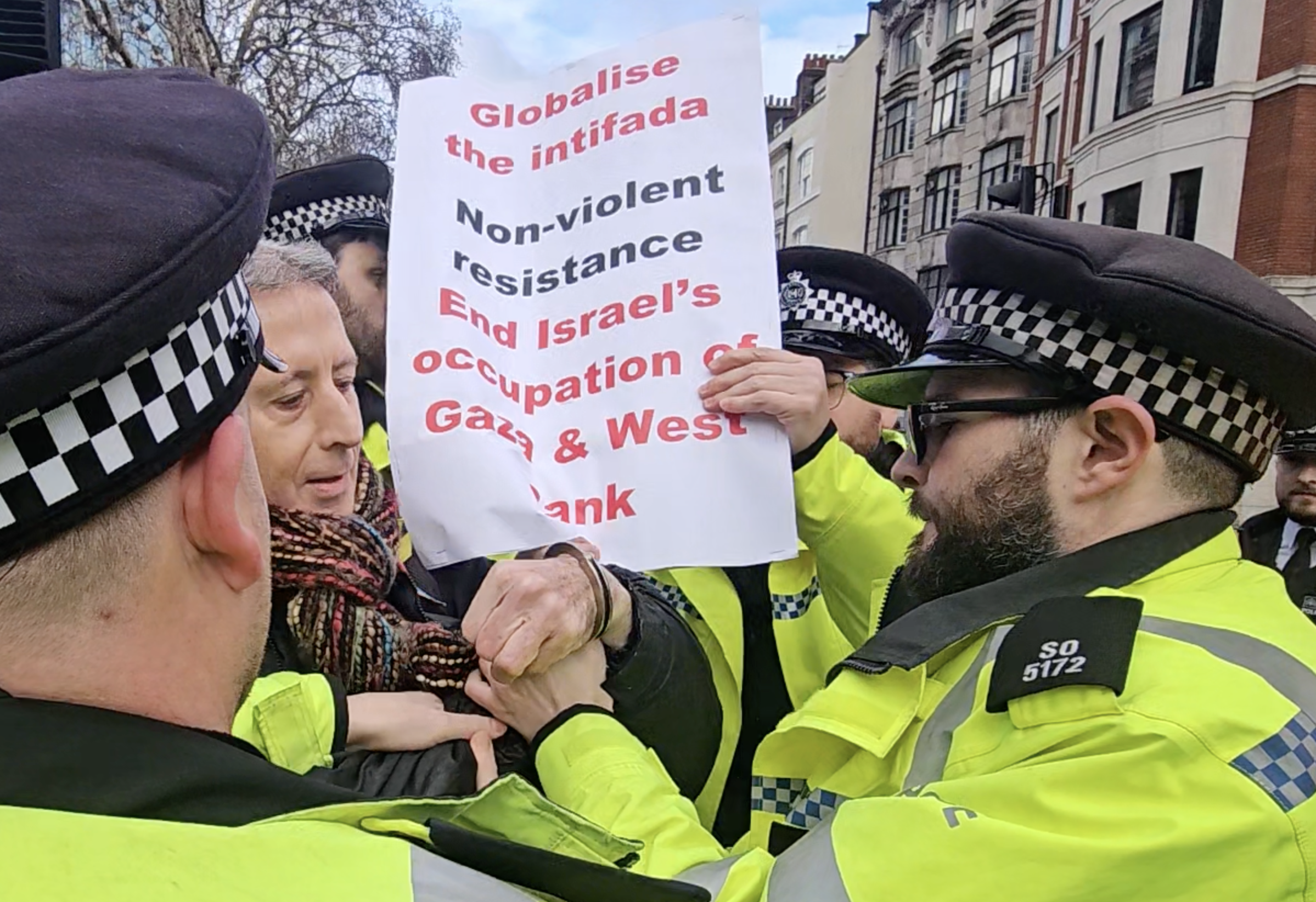 Peter Tatchell arrested for carrying ‘globalise the intifada’ placard at protest