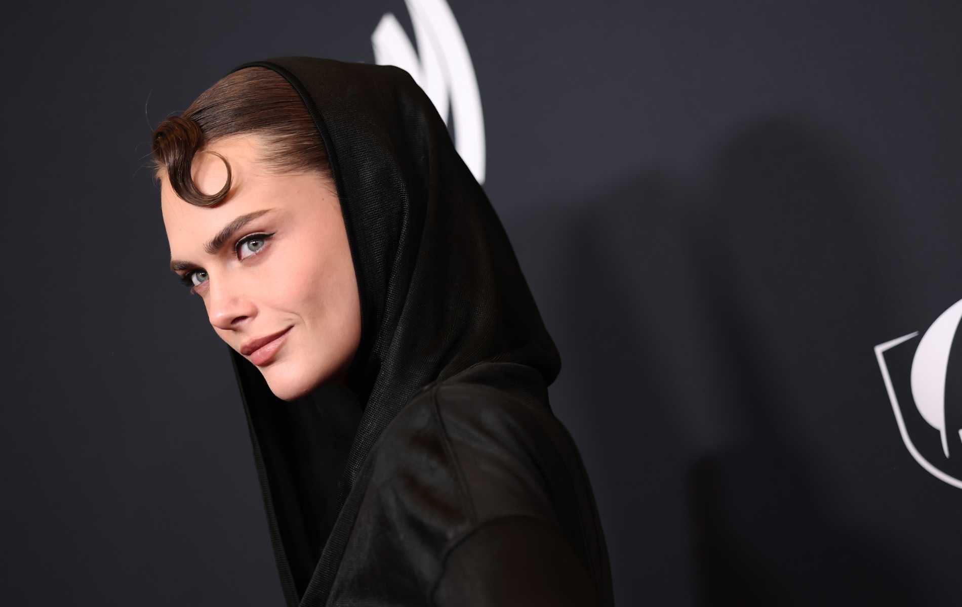 Cara Delevingne and girlfriend Minke make rare public appearance as a couple